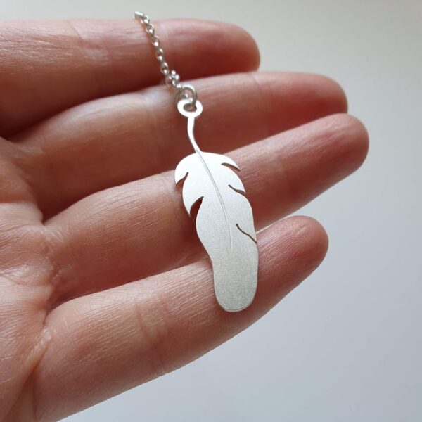 feather shaped silver locket